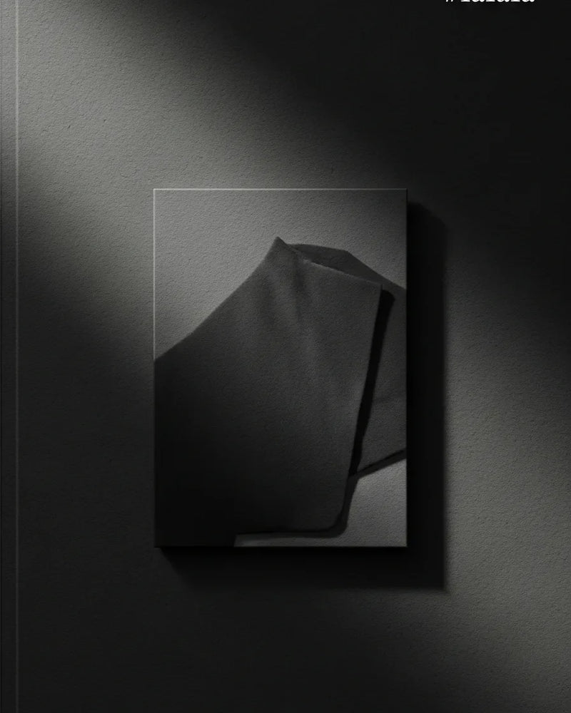 Editorial cover — The Return of Considered Dressing — atmospheric charcoal tonal