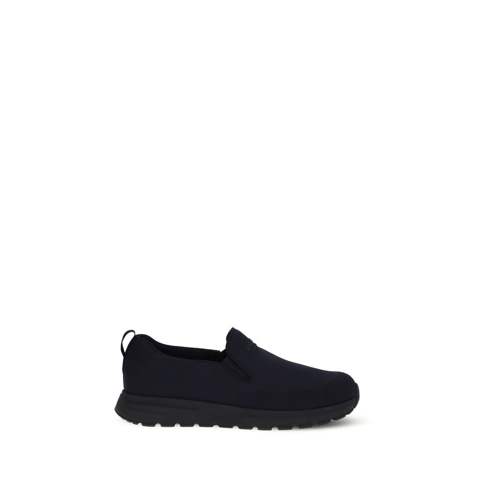 Prada Textured Fabric Slip-On Sneakers in Blue