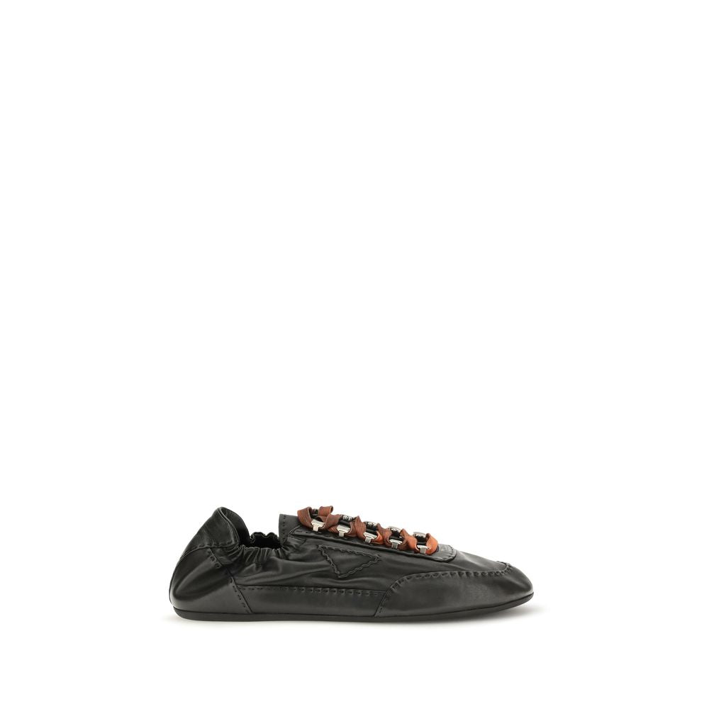 Prada Aged Nappa Leather Sneakers in Black