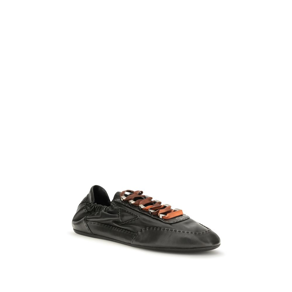 Prada Aged Nappa Leather Sneakers in Black